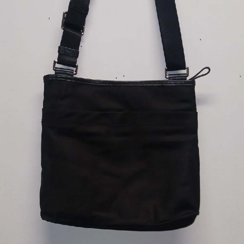 Tumi Black Messenger Bag with Adjustable Strap